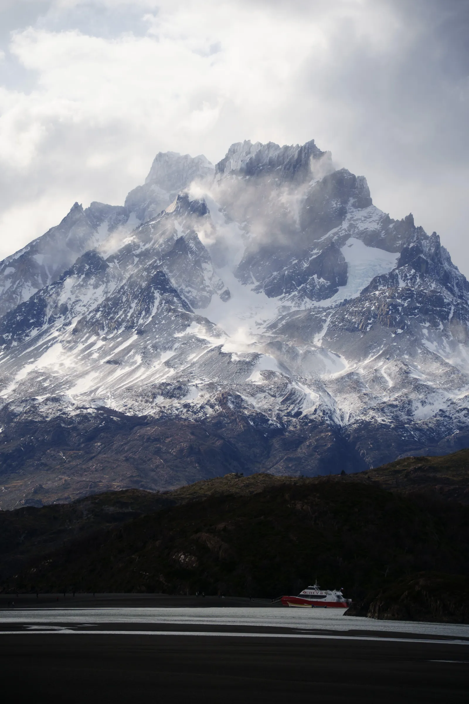 Snow-covered Paine Grande rising above Lake Pehoé